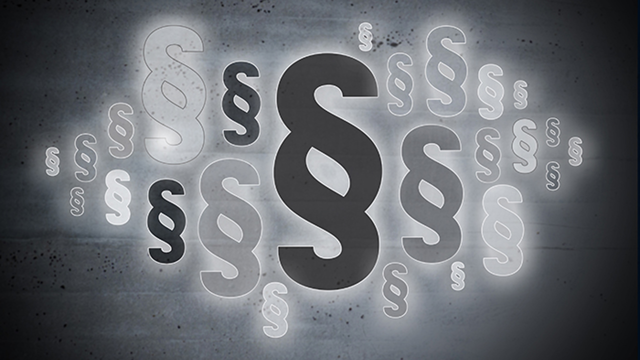 diverse paragrafsymboler på sort-hvit bakgrunn